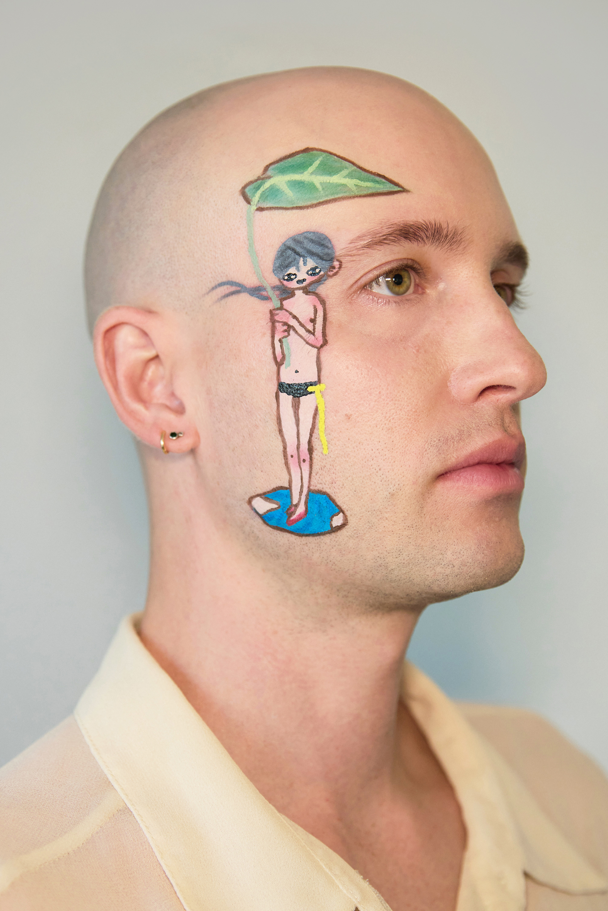 Close up 3/4 portrait of Jesse with a character by aya takano holding a leaf and standing in a puddle painted on his face